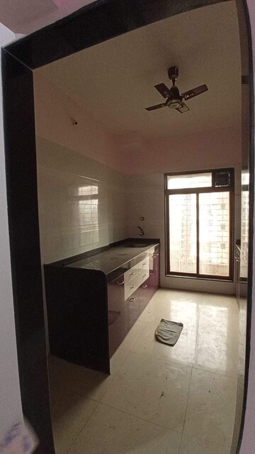Kitchen in 2 BHK Apartment at Agarwal And Doshi Complex, Vasai West – for Sale