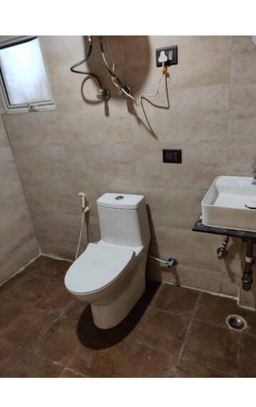Bathroom in 2 BHK Apartment at M R Platinum 321, Raj Nagar Extension – for Sale