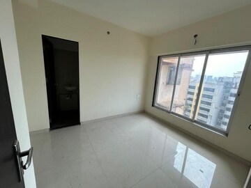 Master Bedroom in 1 BHK Apartment at Trumph Sai Sadan, Dahisar East – for Sale