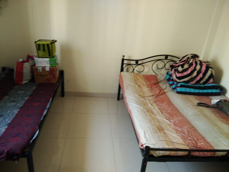 Bedroom, magarpatta-city-zinnia 1 Bedroom 550 Sq.Ft. Apartment In Hadapsar Pune 7716837