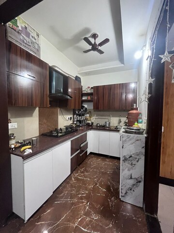 Kitchen in 3 BHK Builder Floor at Shakti Khand 2 – for Sale