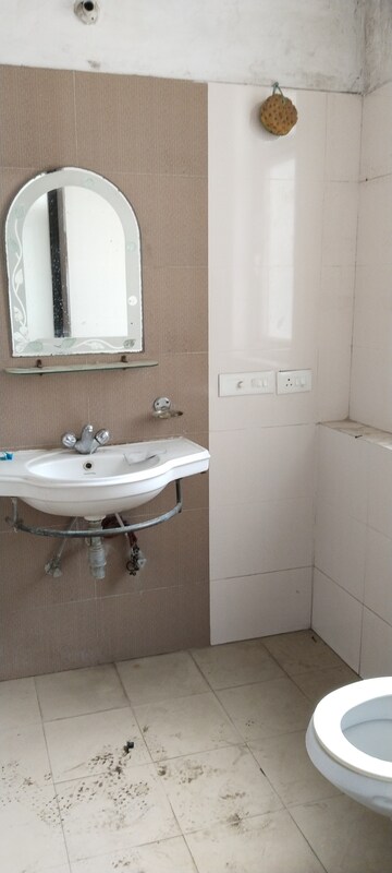 Bathroom in 2 BHK Apartment at Ramprastha Greens Pearl Court, Shahpur Bamheta – for Rent