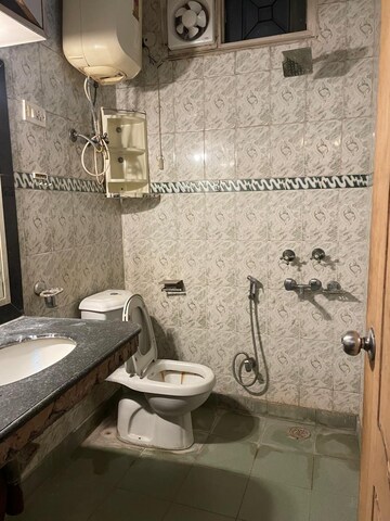 Bathroom in 3 BHK Builder Floor at Khirki Extension – for Sale