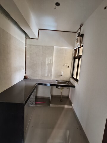 Kitchen in 2 BHK Apartment at Thane West – for Sale