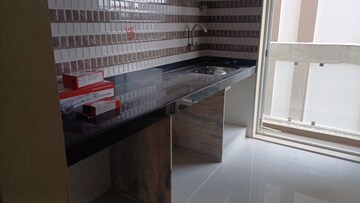 Kitchen in 1 BHK Apartment at Naupada – for Sale