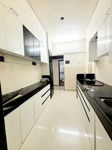 Kitchen in 1 BHK Apartment at Atul Blue Empire, Kandivali West – for Sale