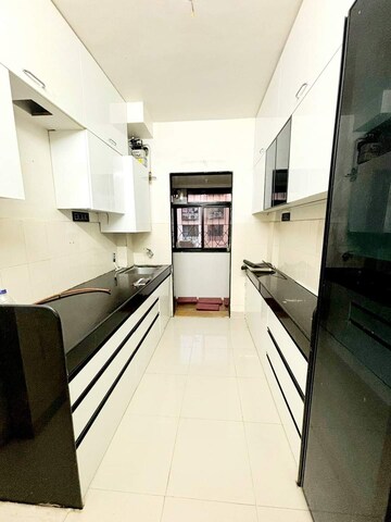 Kitchen in 1 BHK Apartment at Atul Blue Empire, Kandivali West – for Sale