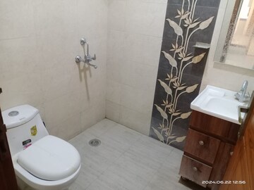 Bathroom in 2 BHK Builder Floor at Chattarpur – for Sale