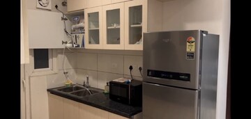 Kitchen in 2 BHK Apartment at Gulshan Botnia, Sector 144 – for Sale