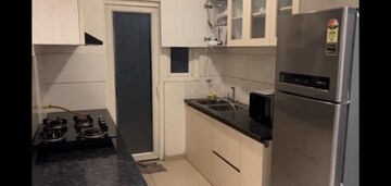 Kitchen in 2 BHK Apartment at Gulshan Botnia, Sector 144 – for Sale