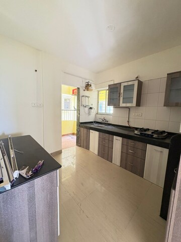 Kitchen in 3 BHK Apartment at Ganesham Phase I, Pimple Saudagar – for Rent