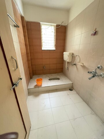 Bathroom in 3 BHK Apartment at Ganesham Phase I, Pimple Saudagar – for Rent