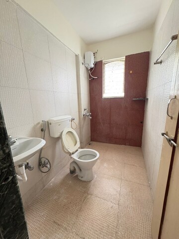 Bathroom in 3 BHK Apartment at Ganesham Phase I, Pimple Saudagar – for Rent