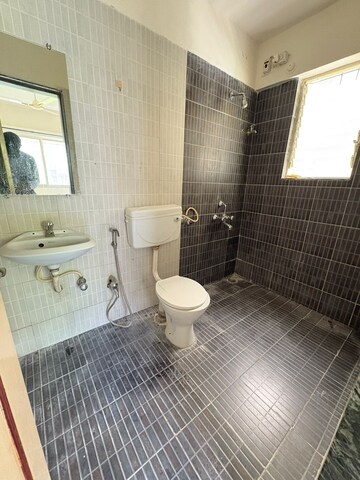 Bathroom in 3 BHK Apartment at Ganesham Phase I, Pimple Saudagar – for Rent