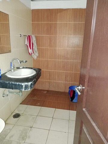 Bathroom in 2.5 BHK Apartment at Paramount Symphony, Sain Vihar – for Sale