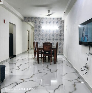 Living Room in 3 BHK Apartment at Emaar Palm Gardens, Sector 83 – for Sale