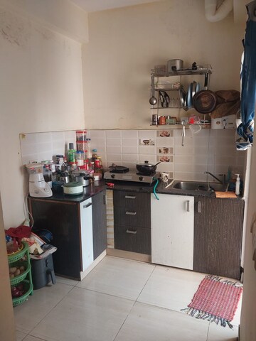 Kitchen in 2 BHK Apartment at Charms Castle, Raj Nagar Extension – for Sale