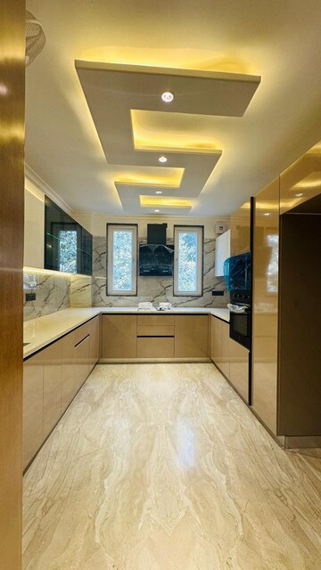 Kitchen in 3.5 BHK Builder Floor at Suncity Heights, Sector 54 – for Sale