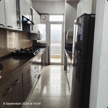 Kitchen in 3.5 BHK Apartment at Emaar Palm Gardens, Sector 83 – for Sale