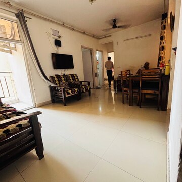 Living Room in 2.5 BHK Apartment at Nirala Aspire, Panchsheel Green – for Sale