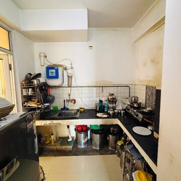 Kitchen in 2.5 BHK Apartment at Nirala Aspire, Panchsheel Green – for Sale