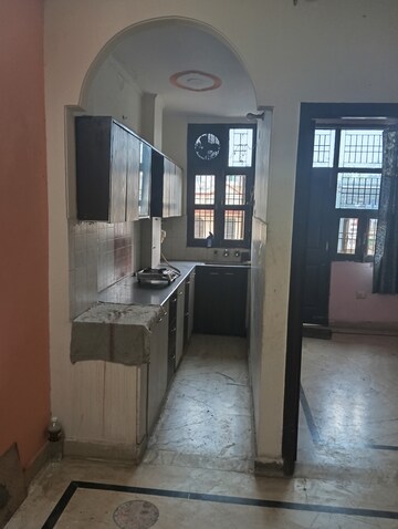 Kitchen in 1.5 BHK Builder Floor at Shalimar Garden Extension I – for Sale