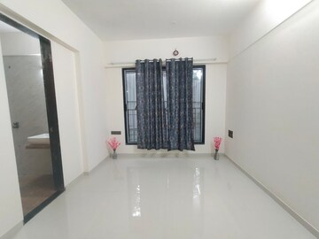 Living Room in 2 BHK Apartment at Rawal Holy Family CHSL, Ic Colony – for Sale