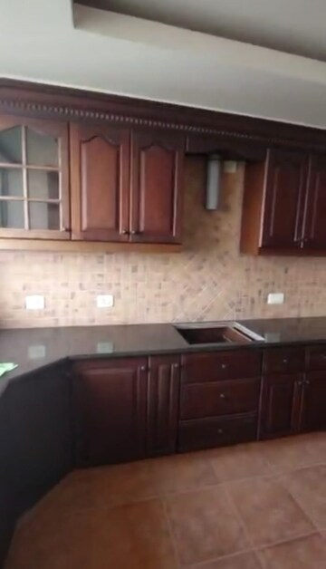 Kitchen in 4 BHK Apartment at Thevara – for Sale