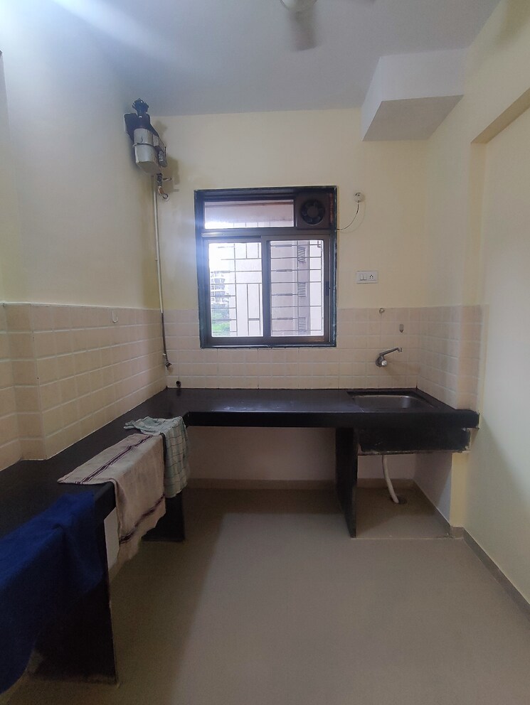 Kitchen, raunak-delight 1 Bedroom 401 Sq.Ft. Apartment In Owale Thane 7728003