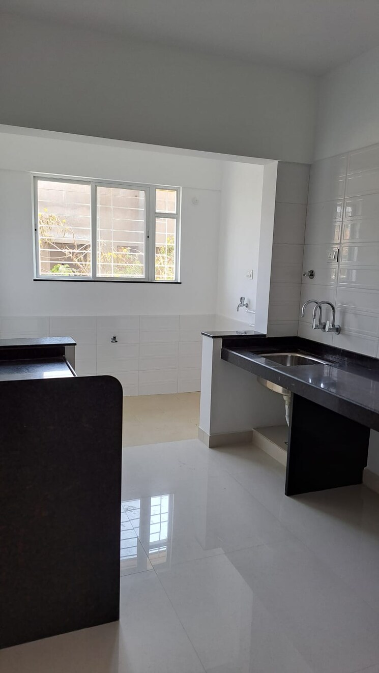 Kitchen, rainbow-blue-roof-sera 2 Bedroom 791 Sq.Ft. Apartment In Sus Pune 7728135