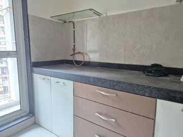 Kitchen in 1 BHK Apartment at JP North Aviva, Mira Road – for Sale