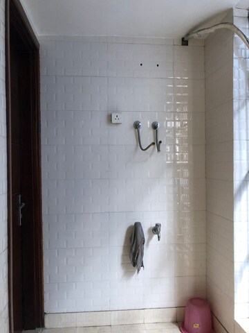 Bathroom in 3.5 BHK Builder Floor at Kohat Enclave – for Sale