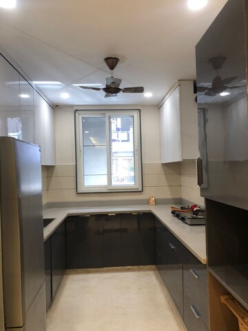 Kitchen in 3.5 BHK Builder Floor at Kohat Enclave – for Sale