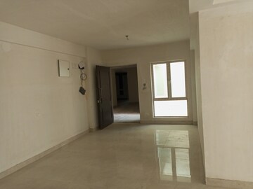 Living Room in 4 BHK Apartment at Arch Starwood, Chinar Park – for Sale
