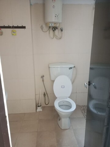 Bathroom in 3 BHK Apartment at Mahagun Mascot, Sain Vihar – for Sale