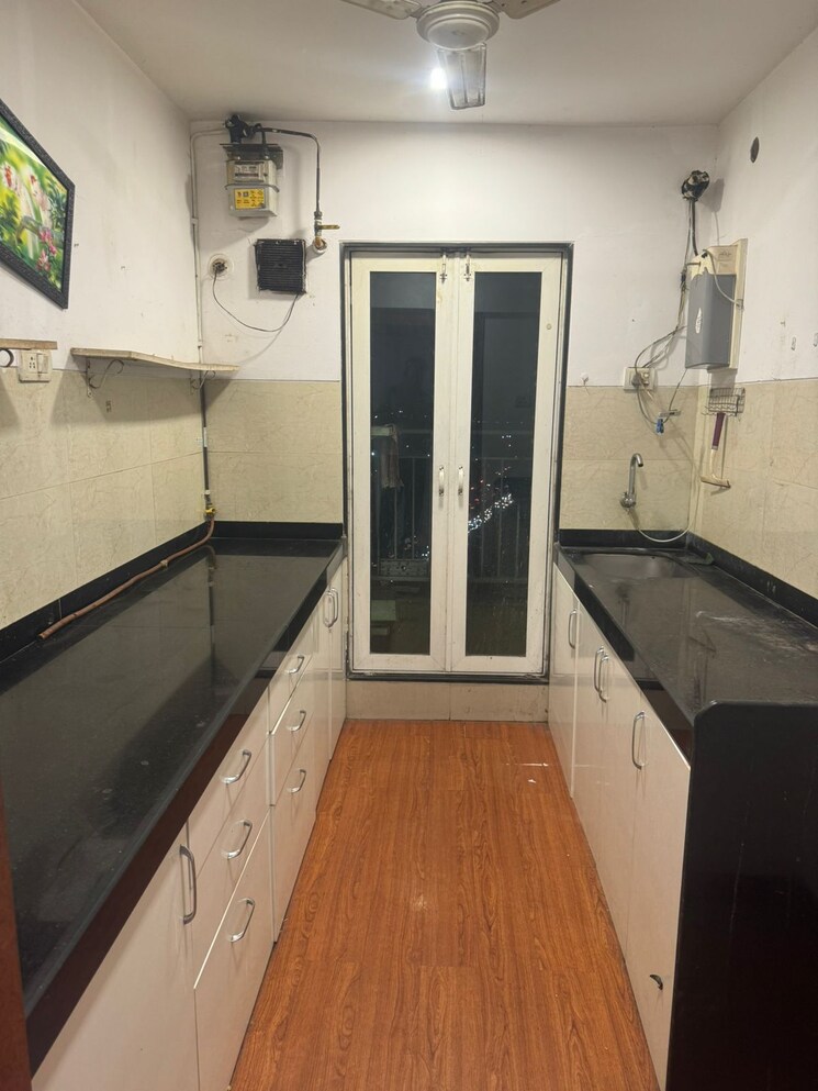 Kitchen, rustomjee-urbania-atelier 2 Bedroom 610 Sq.Ft. Apartment In Majiwada Thane 7731354