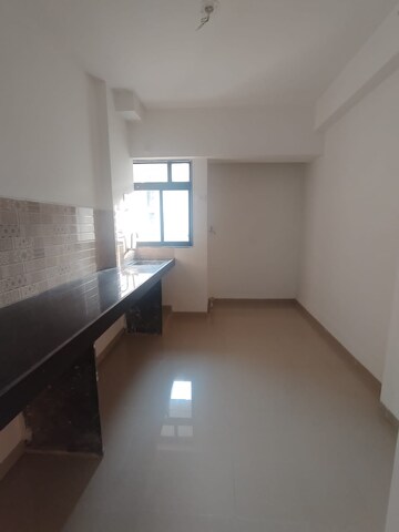 Kitchen in 1 BHK Apartment at Titanium Tower, Haware City – for Sale
