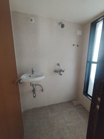 Bathroom in 1 BHK Apartment at Titanium Tower, Haware City – for Sale