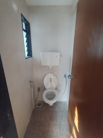 Bathroom in 1 BHK Apartment at Titanium Tower, Haware City – for Sale