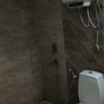 Bathroom in 2.5 BHK Apartment at Amrapali Silicon City, Sector 76 – for Sale