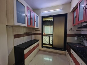 Kitchen in 2 BHK Apartment at Safal Complex, Nerul – for Rent