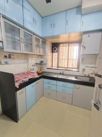 Kitchen in 1 BHK Apartment at Runwal Garden City, Balkum Pada – for Sale