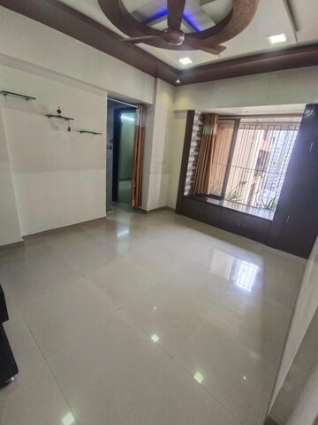 Living Room in 1 BHK Apartment at Runwal Garden City, Balkum Pada – for Sale
