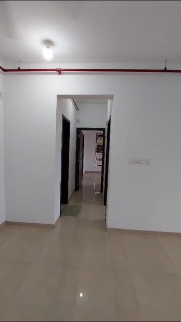 Room in 2 BHK Apartment at Mahindra Roots, Kandivali East – for Sale