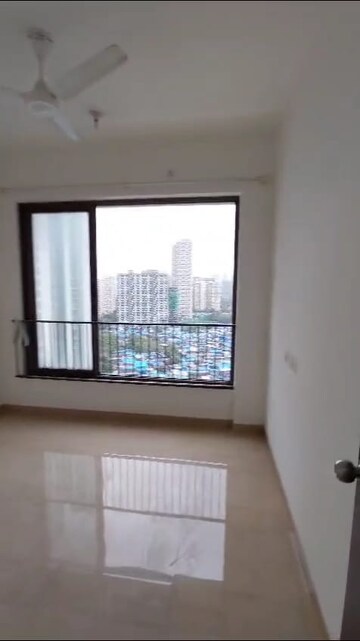 Room in 2 BHK Apartment at Mahindra Roots, Kandivali East – for Sale