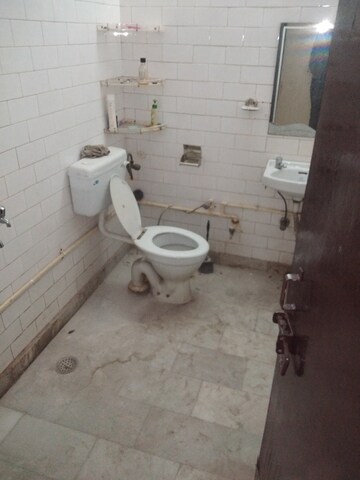 Bathroom in 4 BHK Builder Floor at Rohini Sector 7 – for Rent