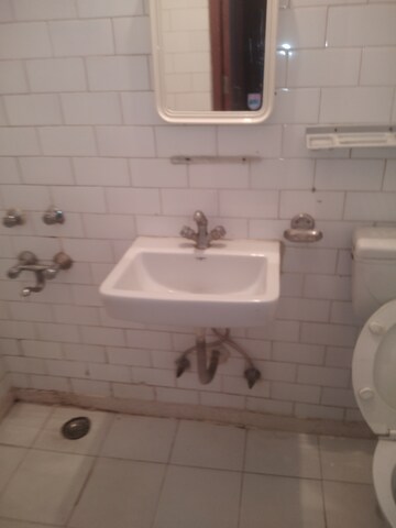 Bathroom in 4 BHK Builder Floor at Rohini Sector 3 – for Rent
