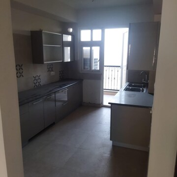 Kitchen in 4 BHK Apartment at ATS Triumph, Dhanwapur – for Sale