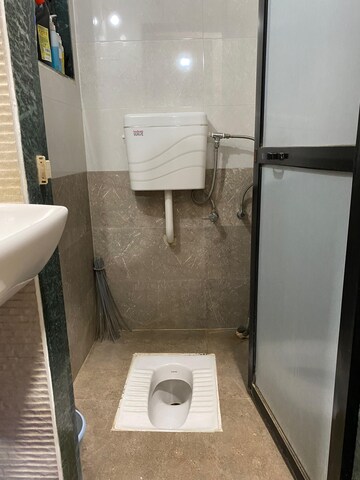 Bathroom in 1 BHK Apartment at Swastik Residency Phase II CHS Ltd, Ghodbunder Road – for Sale