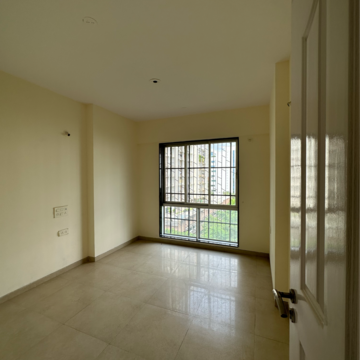 Room in 2 BHK Apartment at Divine Aspen Garden, Sonawala Industry Estate – for Sale